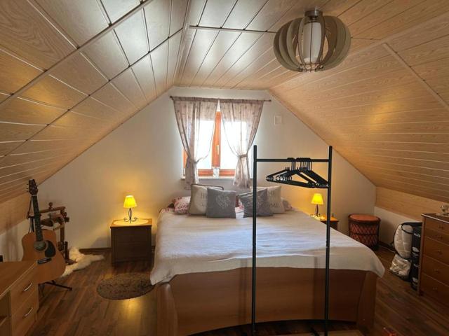 Attic bedroom with a double bed