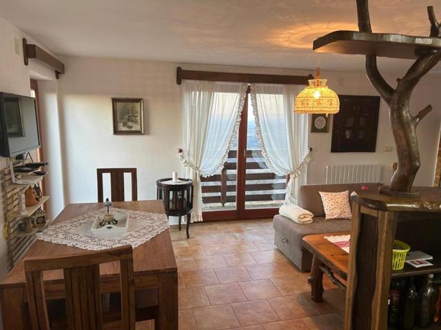 Dining table by the balcony doors