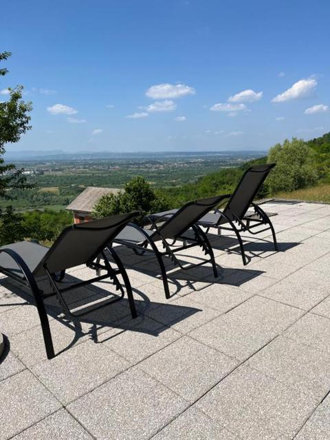 Sun loungers facing the valley