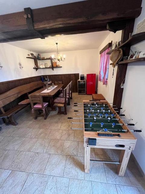 Table football in front of the dining room